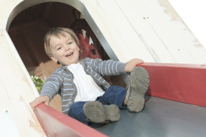 A nice kid playing in the playground