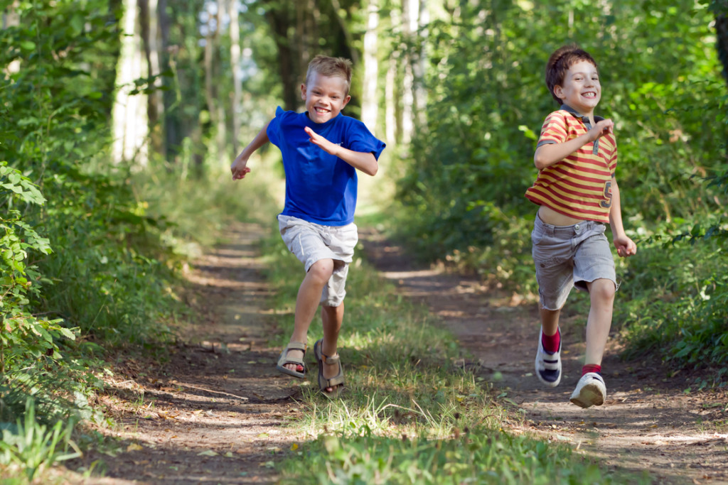 Young chidren running in nature